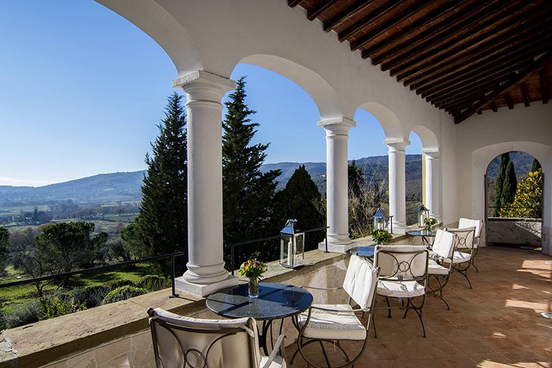 A scenic view of Tuscany from the patio deck of a villa