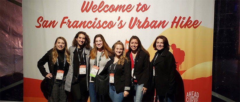 Wendy Olliff stands with a group of students who have gone to California for 2020 Professional Convention Management Association Convening Leaders conference  in San Francisco in January.