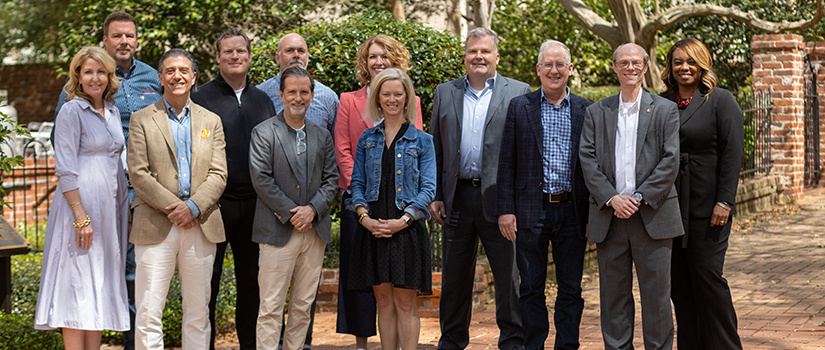 The 2022 Department of Retailing Board stands outside on the Horseshoe together for group photo.