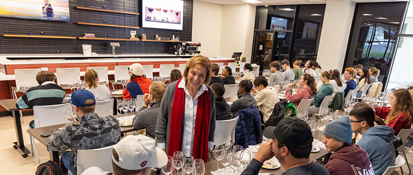 Sandy Strick speaks with students in the Beverage Education Laboratory