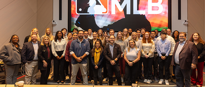 Group of students, faculty and staff at MLB headquarters in NYC
