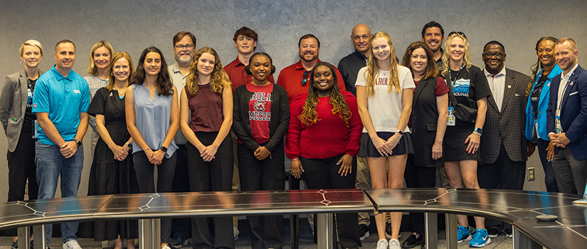Tepper Scholars, HRSM faculty and staff, and Panthers executives pose