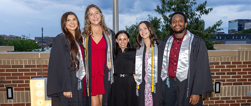 Tepper Scholars Hannah Margeson, Madelin McLean, Jordan Mooring and Devon Watson pose with Nicole Tepper