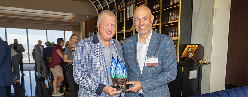 Dean Michael Sagas presents the University of South Carolina College of Hospitality, Retail and Sport Management's 2026 Visionary Innovation & Leadership Award to Circa Resort & Casino owner and CEO Derek Stevens at Circa Resort & Casino in Las Vegas.