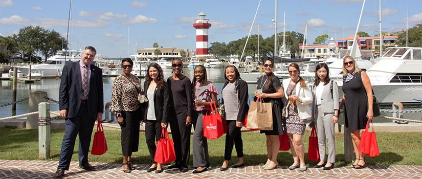 Hospitality, Retail and Sport Management students visit the Sea Pines Resort on Hilton Head Island to tour their facility and learn about their 5-month internship program and opportunities to work the Heritage Golf Tournament each April. Here they are pictured in the boat basin at Hilton Head Harbor.
