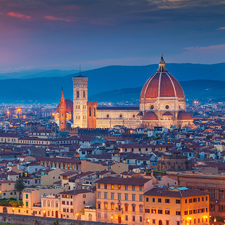 An aerial view of Florence, Italy, at dusk.