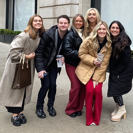 Six retailing students pose for a photo together in New York City.