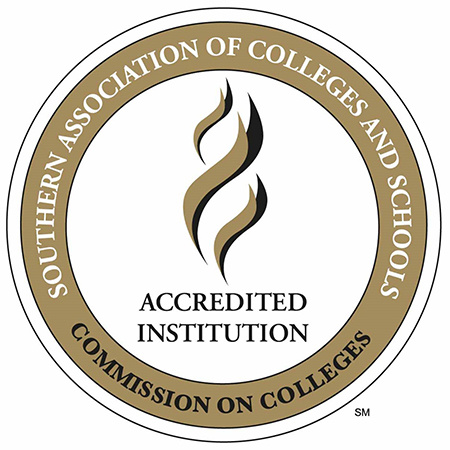 Stamp logo stating Southern Association of College and Schools Accredited Institution Commission on Colleges