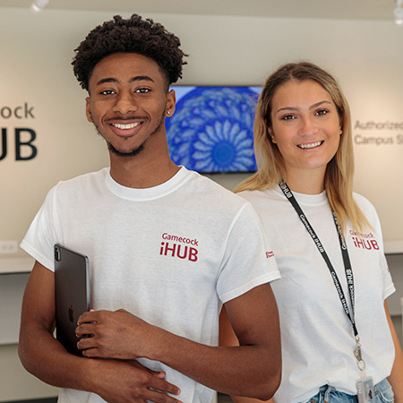 Two Gamecock iHub student workers pose for a photo
