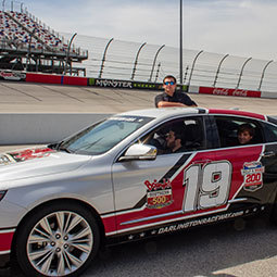 Students spend a day at Darlington Raceway with executives and No. 22 NASCAR driver Joey Logano. They even get to ride in the car.