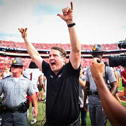 First place winner, Shreyas Saboo: photo of Will Muschamp celebrating last year's win over the University of Georgia