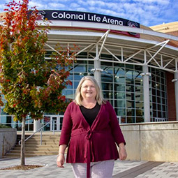 Michelle Knight stands in front of Colonial Life Arena on a clear and beautiful fall day.