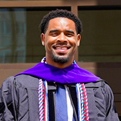 Image of Javis Benford in his graduate gown