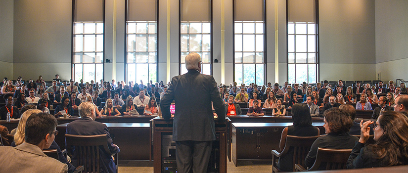 Law school dean Rob Wilcox addresses students during orientation.