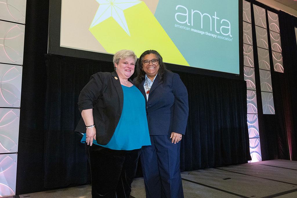 Dr. Ann Blair Kennedy pictured with Cindy E. Farrar, AMTA National President. This image was provided by the American Massage Therapy Association (AMTA).