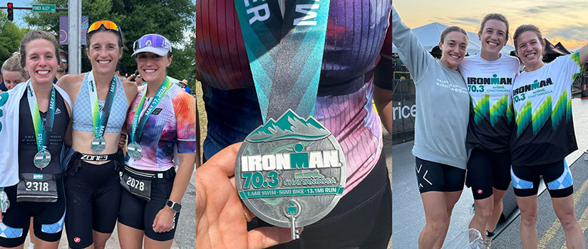 Girls smiling with medals from their Iron Man competition.