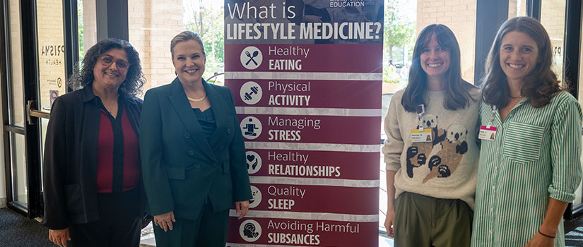 Students presenting at the inaugural LMED research symposium.