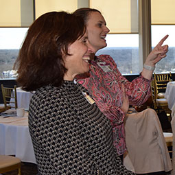 Two people mingling and talking