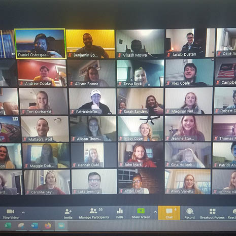 Screenshot of an international business Zoom meeting with more than 100 participants