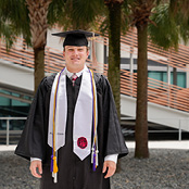 Image of Eric Beck in his cap and gown