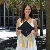 Image of Harleigh Price with her graduation cap