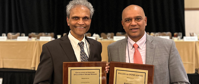 Image of Rohit Vurma and Sanjay Ahire accepting their POMS awards