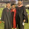 Caitlin Smoot, Jennifer Parker-Harley and Blair Mothersbaugh pose for a picture on the field at Williams Brice Stadium for the Spring 2021 graduation ceremony.