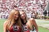 two Coquettes pose on the field at Williams Brice football stadium