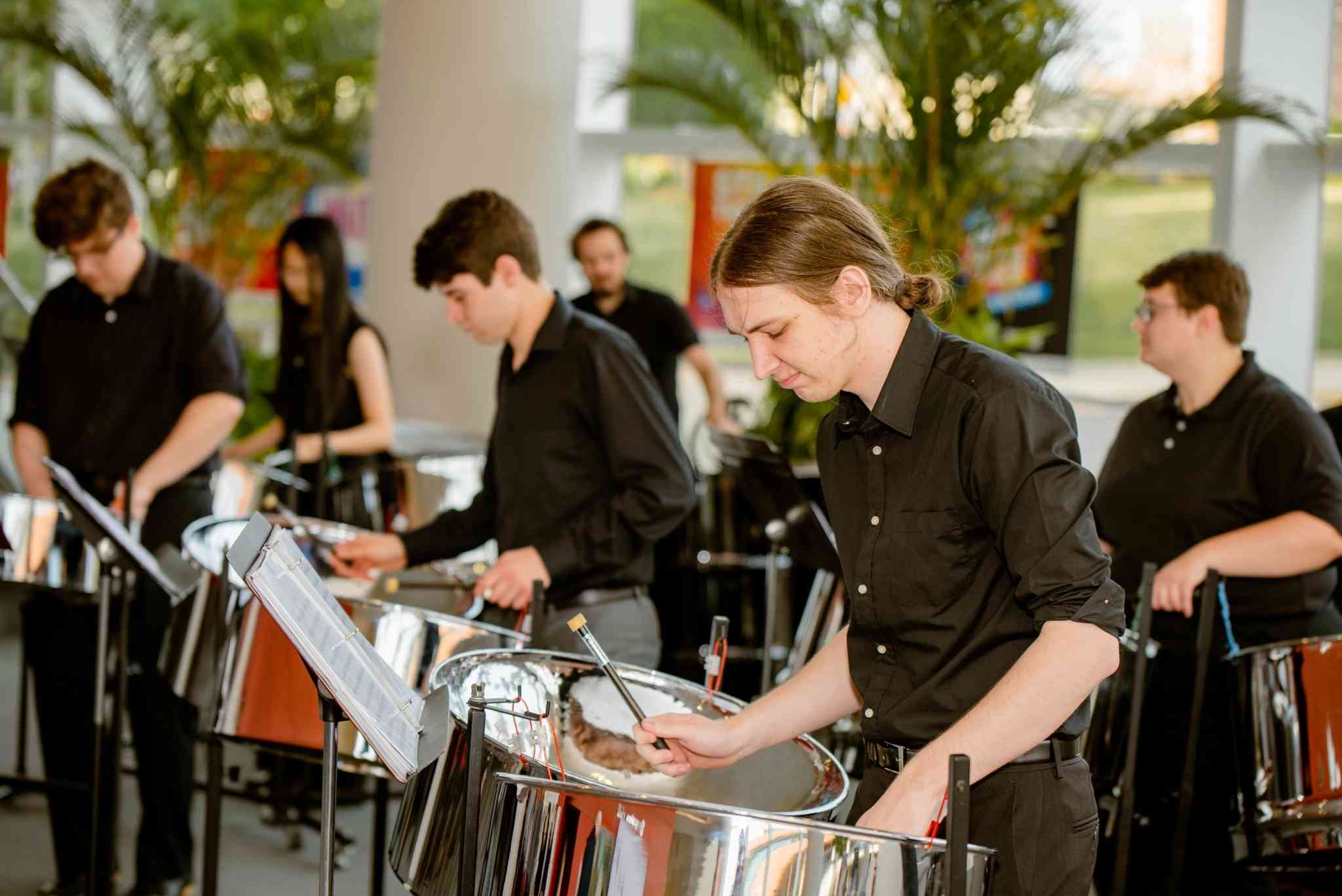 Students playing the pans