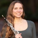Sydney Fulcher holding an oboe