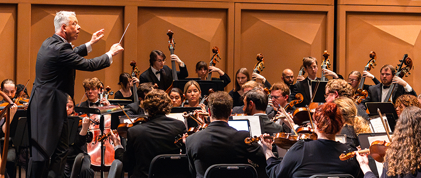 Conductor Scott Weiss leads the USC Symphony Orchestra