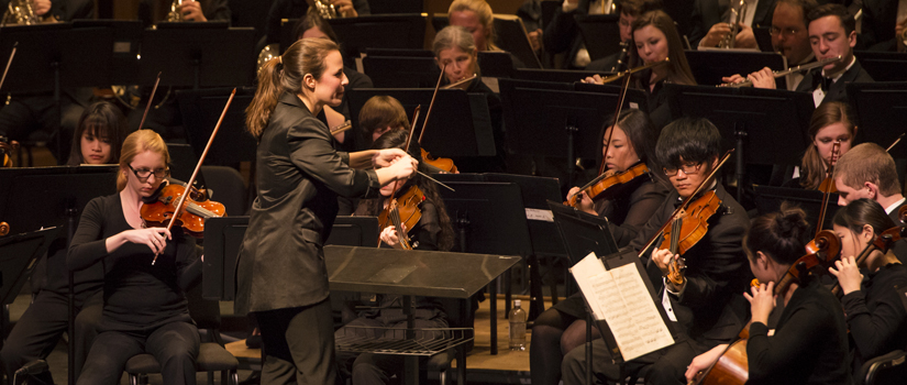 Student conducting USC Symphony Orchestra