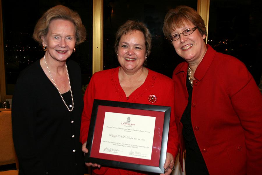 Dean Hewlett honored by Alumni