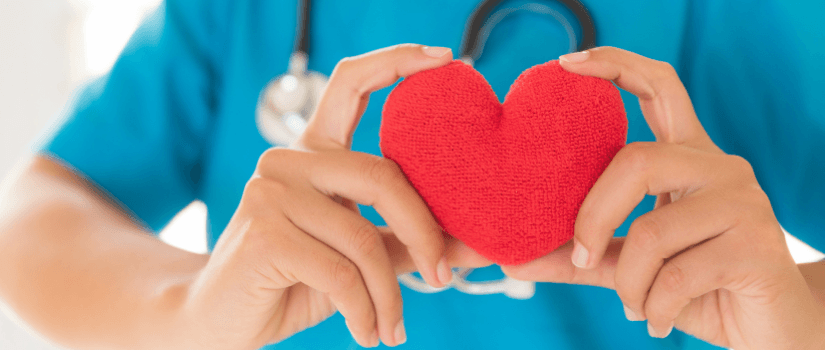 nurse holding heart