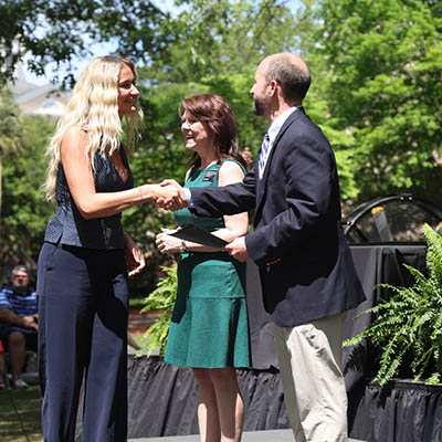 Cassandra Fallon receiving the Outstanding Service to the College Award