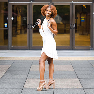 kennedy golden standing in front of nursing building holding stethoscope