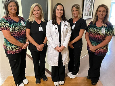 Casey Purcell with wound care team