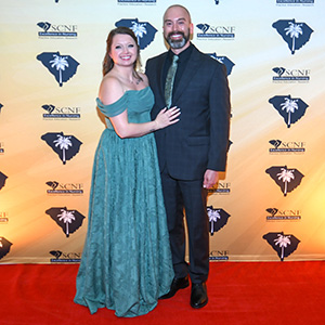 courtney geyer with her husband at the palmetto gold award ceremony