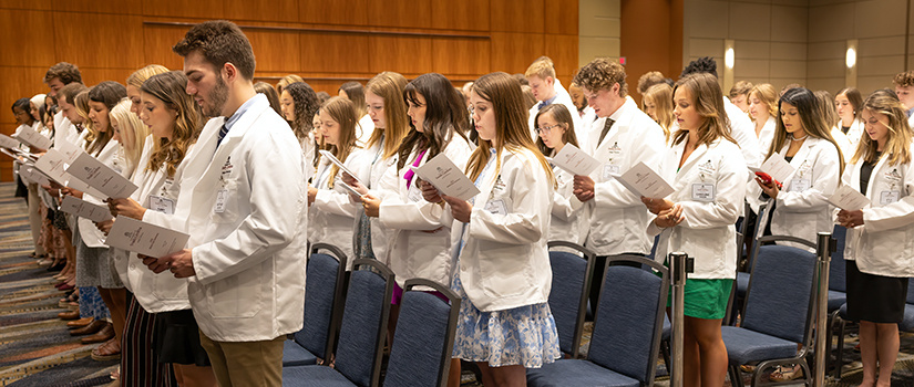 Students at white coat ceremony