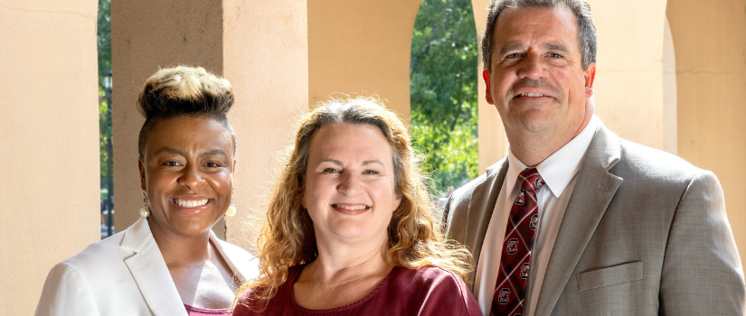 Group of three alumni