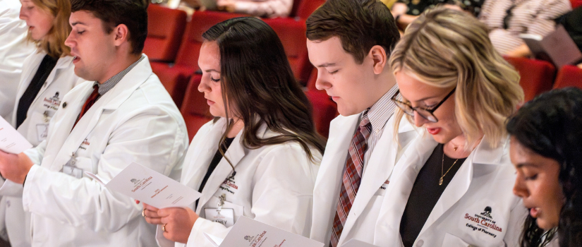 Students at white coat ceremony