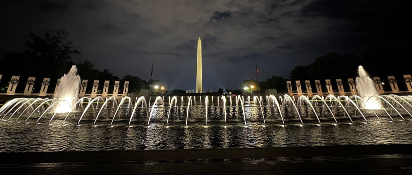 Nighttime image of Washington, D.C. monuments and fountains