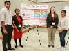 Victoria Adebiyi, Fahmida Akter, and Sharraf Samin presenting their poster titled, "Dietary Acculturation of East Asian Students in the University of South Carolina."