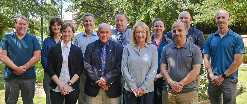 Students harvesting crops in a field