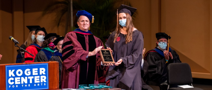Kara Keiper receiving master's student award