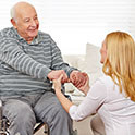 Social worker with senior citizen patient