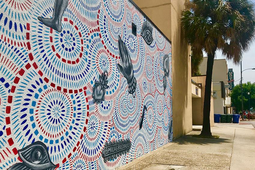 Multi-color spiral mural by Milagros Collective on Assembly and Taylor streets.
