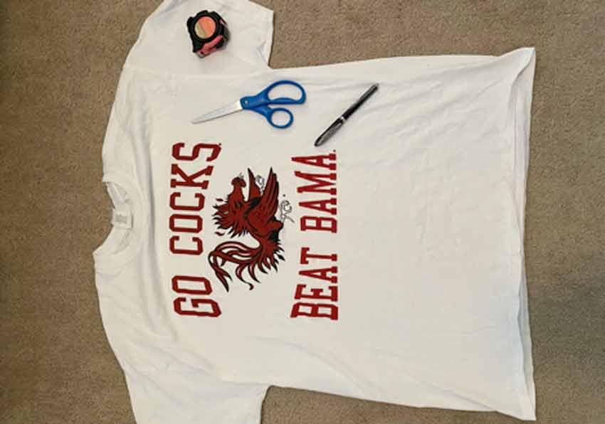 What you need: a large Gamecock shirt, scissors, a pen and a ruler or tape measure.
