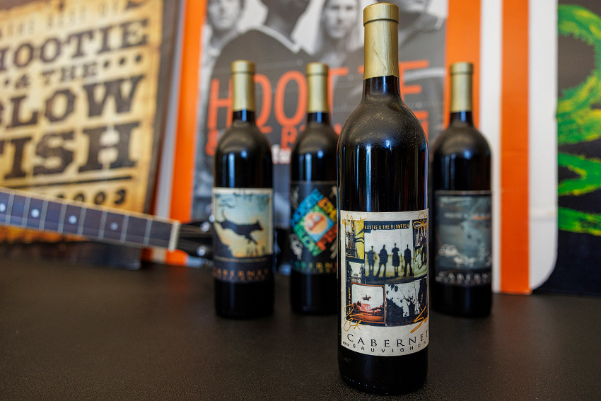 Noble's collection includes Hootie and the Blowfish wine, with labels identifying each of the band's albums