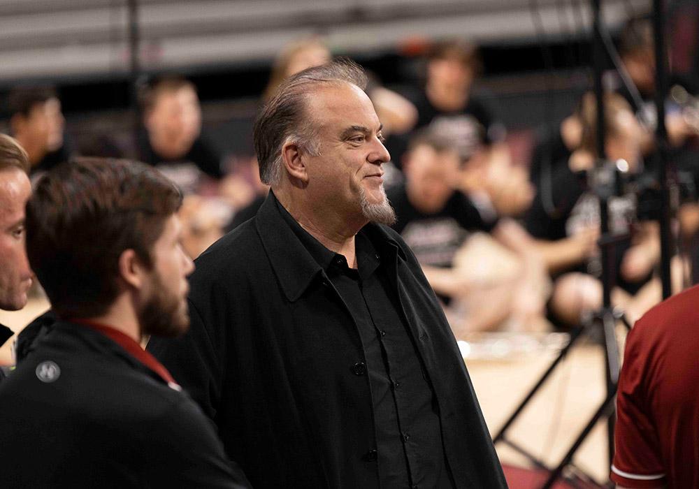 JD Shaw, Associate Professor of Horn and Carolina Band arranger, looks on from the wings.